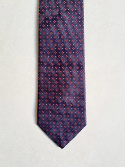 CRAVATTA MOTIVO MICRO FIORELLINO BLU ROSSO