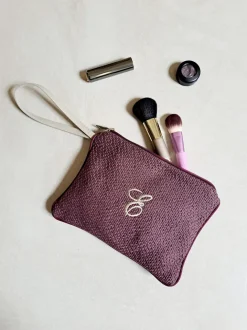 POCHETTE CON MANICO MONOGRAM
