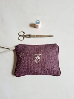 POCHETTE CON MANICO MONOGRAM