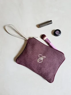 POCHETTE CON MANICO MONOGRAM