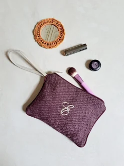 POCHETTE CON MANICO MONOGRAM